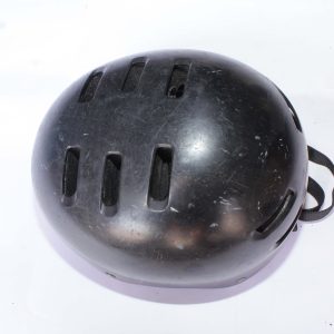 Black sports helmet with ventilation slots and adjustable strap, designed for impact protection and comfort.