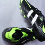 Black and Lemon Football Boots for all surfaces, offering superior grip, ankle support, and lightweight comfort. Designed for ultimate performance and style, available in all sizes.