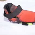 Century Martial Arts Foot Guard with red and black padded design and a reinforced strap for secure fit and protection.